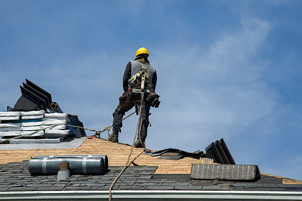 Professional Roof Replacement technician working in Dunstable, MA